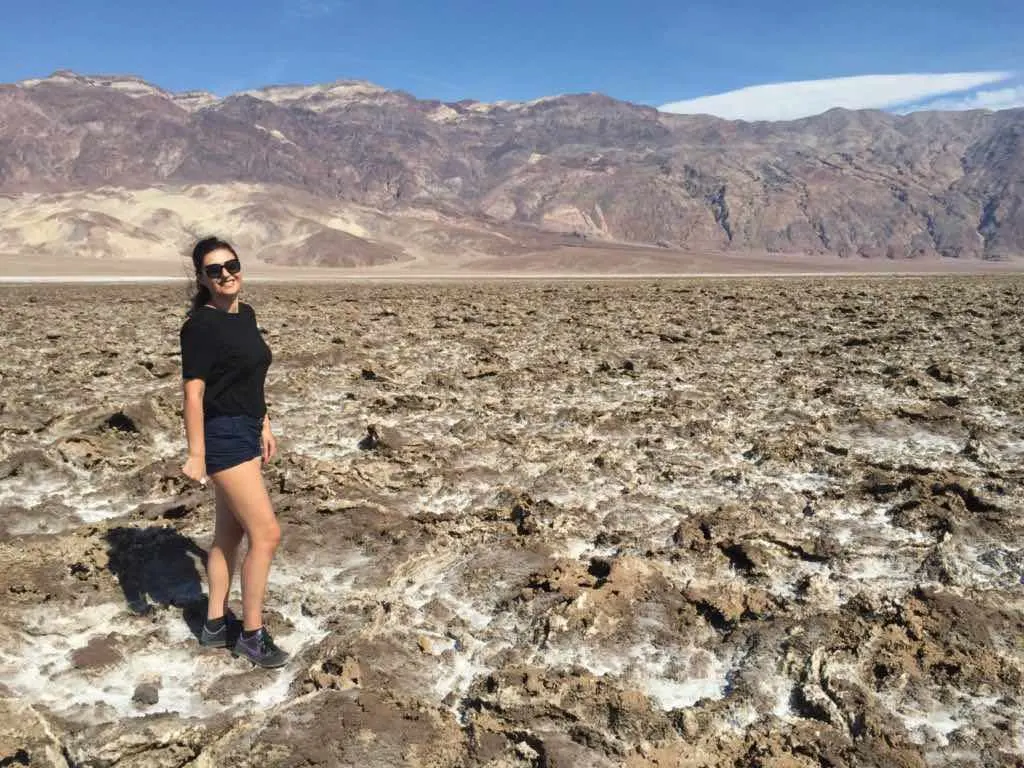 Milijana Gabrić, the travel blogger of WorldTravelConnector.com in Devil's Golf Course in Death Valley I Devil's golf Course is a Death Valley must see