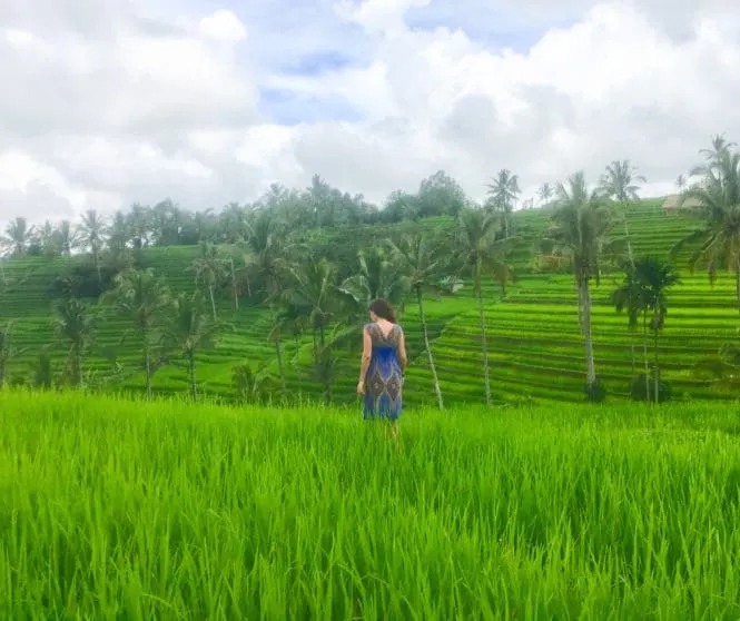 Jatiluwih and Tegalalang Rice Terraces Bali: The Most Beautiful Bali Rice Fields 4 Milijana Gabrić, the travel blogger form WorldTravelConnector.com walking in Jatiluwih Bali rice terraces