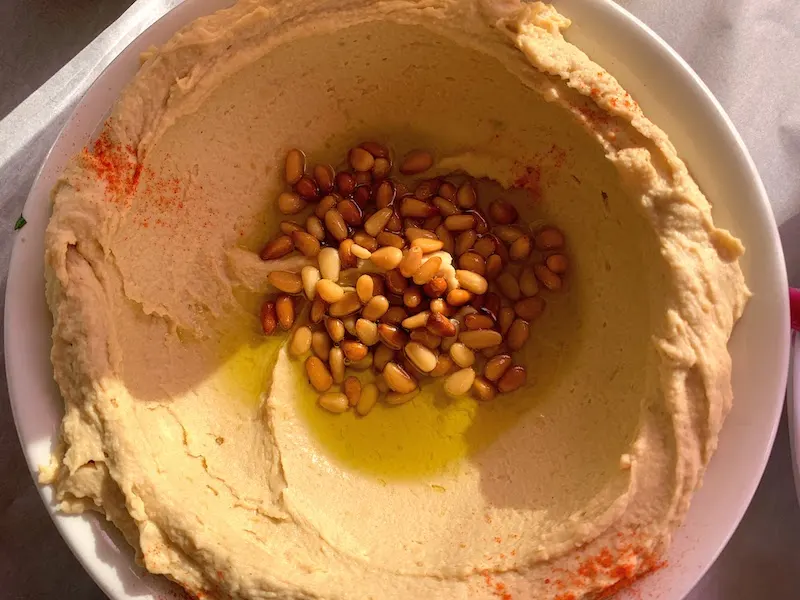 Hummus with pine nuts is a popular Israeli food