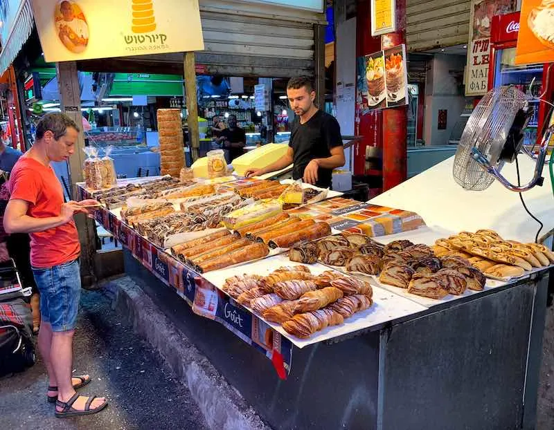 Popular Israeli food: Best Israeli dishes, Israeli desserts, and Israeli drinks (2023) 48 On Carmel Market in Tel Aviv you can find a huge number of popular Israeli food