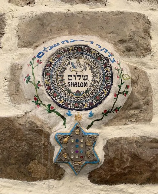 40 Must-See Holy Sites in Israel and the West Bank 67 A detail on a wall in Safed