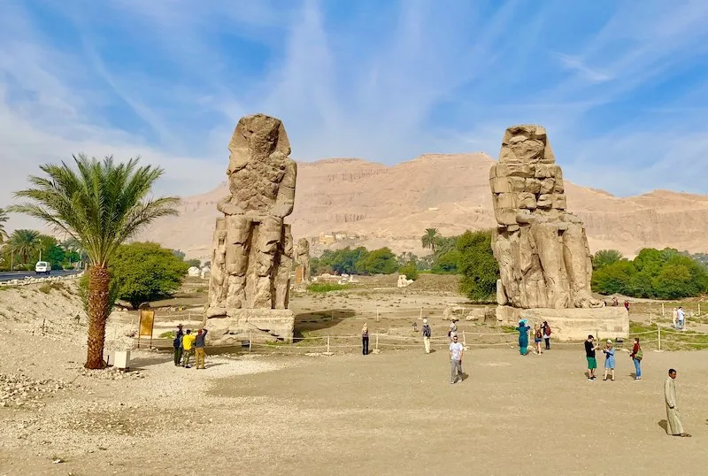 The Colossi of Memnon is one of famous Egypt landmarks and should be on everyone's Egypt bucket list  according to WorldTravelConnector.com I Egypt Landmarks I famous landmarks in Egypt I Ancient Egyptian landmarks I Landmarks in Egypt I Egyptian monuments I Places in ancient Egypt I Egypt Famous Landmarks