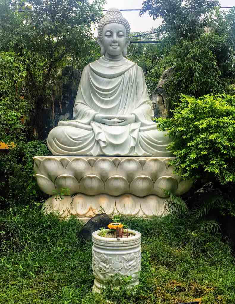 Gautama Buddha statue in Hoi An in Vietnam at WorldTravelconnector.com I Skinny Buddha vs Fat Buddha I buddha figure I 