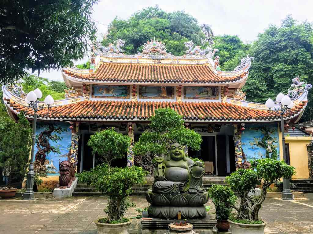 Skinny Buddha vs Fat Buddha_Fat Buddha statue at Tam Tai Pagoda in Da Nang I Photo Taken by WorldTraelConnector.com I I buddha laughing I hotei buddha I  laughing buddha I statue of laughing buddha I  laughing buddha statue I happy buddha statue I budai I Chinese Jolly  Buddha 