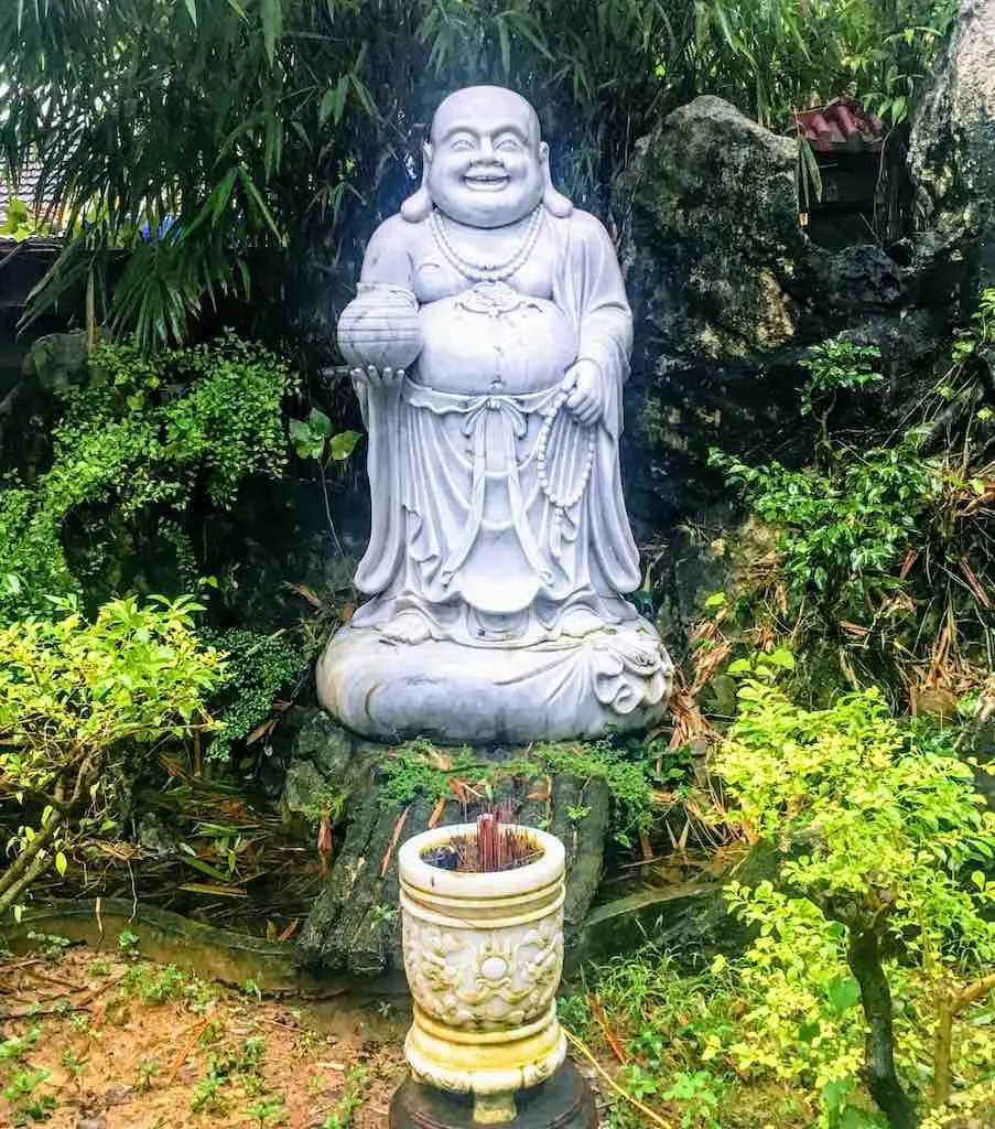 Skinny Buddha vs Fat Buddha in Hoi An in Vietnam