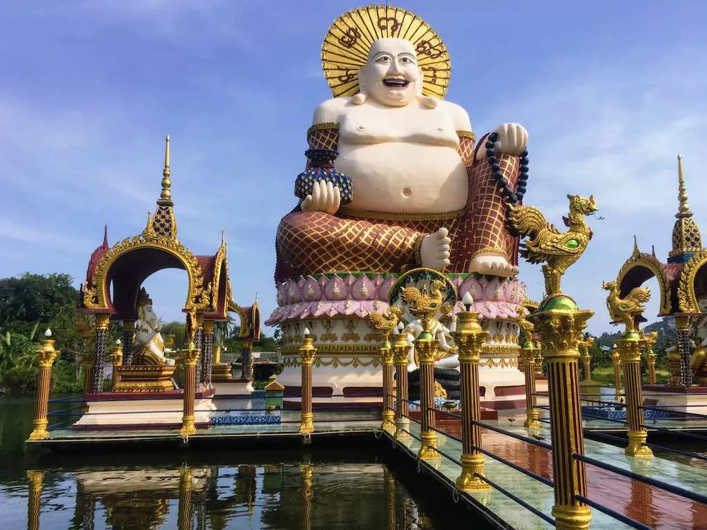 Fat Buddha: Who is the Laughing Buddha 9 Skinny Buddha vs Flat Buddha Jolly Buddha at Wat Plai Laem in Thailand