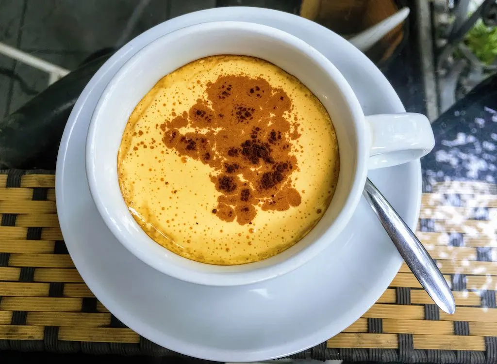 Coffee in Vietnam: Vietnamese Coffee Types You Must Try in Vietnam 14 Egg coffee is one of traditional types of Vietnamese coffee I Coffee in Vietnam by WorldTravelConnector.com I Egg coffee in Vietnam I Traditional Vietnamese coffee I Authentic Vietnam Coffee I types of Vietnamese coffee