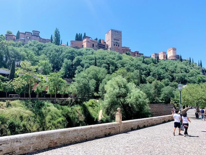 20 Essential Alhambra Tips and Tricks: How to visit Alhambra Palace in Granada, Spain in 2023 15 one of the Alhambra tips is for the best views of Alhambra to go to Carrera del Darro in Granada