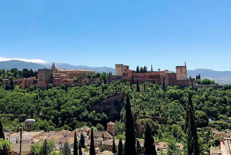 20 Essential Alhambra Tips and Tricks: How to visit Alhambra Palace in Granada, Spain in 2023 5 best views of one of the Alahmabra tips is to go to Albaicín for the best views of Alhambra