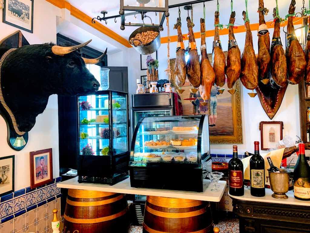 Visiting a tapas bar in Seville on a southern Spain road trip is a must 