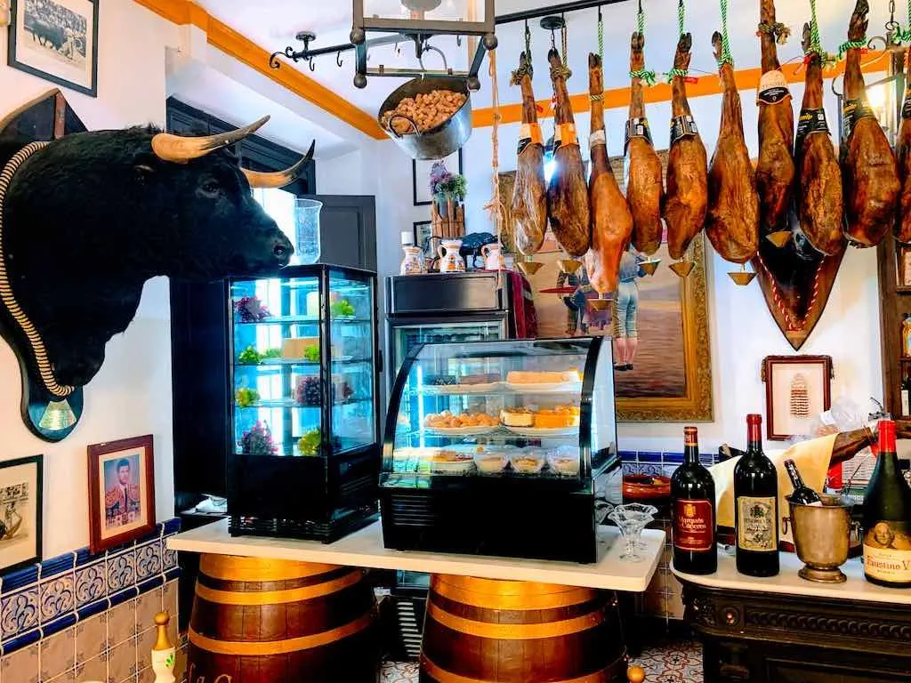 Visiting a tapas bar in Seville on a southern Spain road trip is a must 