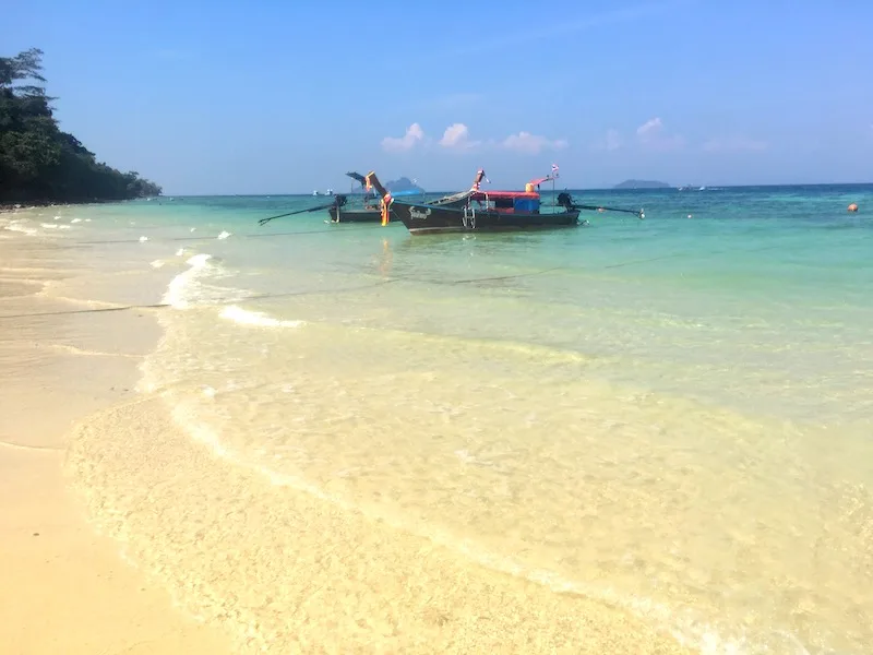 The Best 10 Day Thailand Itinerary (2023) 25 Loh Moo Dee Beach on Koh Phi Phi Don should be on any 10 day Thailand itinerary I 10 Days Thailand Itinerary I Thailand Itinerary 10 Days I Best Things to do in Thailand in 10 days I Best Things to See in Thailand in 10 days I