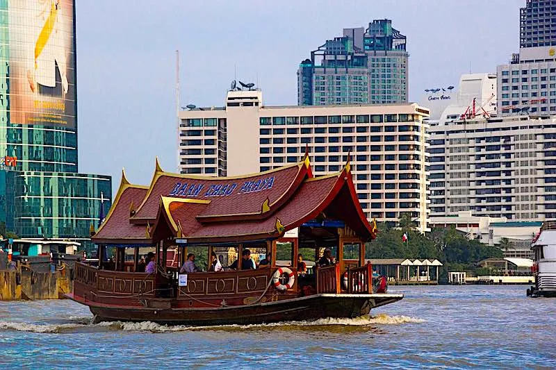 Taking a boat ride on Chao Praya River is one of top things to do in Bangkok 