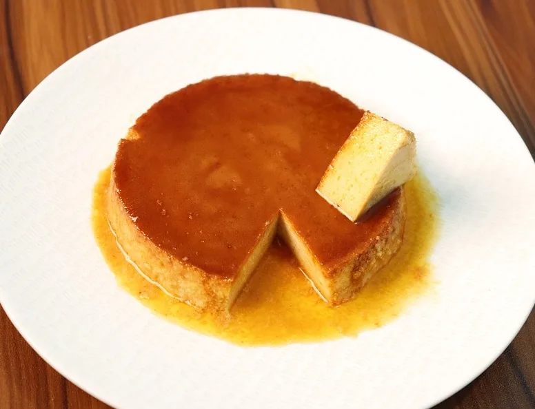 Best Vietnamese Food in Vietnam to Feed Your Inner Foodie on Your Trip To Vietnam 23 Banh Flan dessert is one of the best Vietnamese food in Vietnam I Food in Vietnam I Traditional Vietnamese Food I Famous Vietnamese Food I Most Popular Food in Vietnam I National Food of Vietnam I Popular Vietnamese Dishes I Food at Vietnam I Vietnam Foods I Vietnam Food I Vietnamese Cuisine