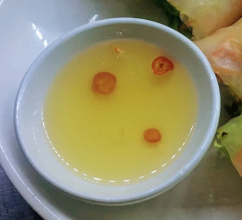 Best Vietnamese Food in Vietnam to Feed Your Inner Foodie on Your Trip To Vietnam 9 Nuoc cham sauce is compulsory on the list of Vietnamese food I Food in Vietnam I Traditional Vietnamese Food I Famous Vietnamese Food I Most Popular Food in Vietnam I National Food of Vietnam I Popular Vietnamese Dishes I Food at Vietnam I Vietnam Foods I Vietnam Food I Vietnamese Cuisine