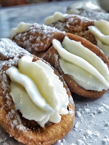 Cannoli are popular cakes and famous traditional foods in Italy