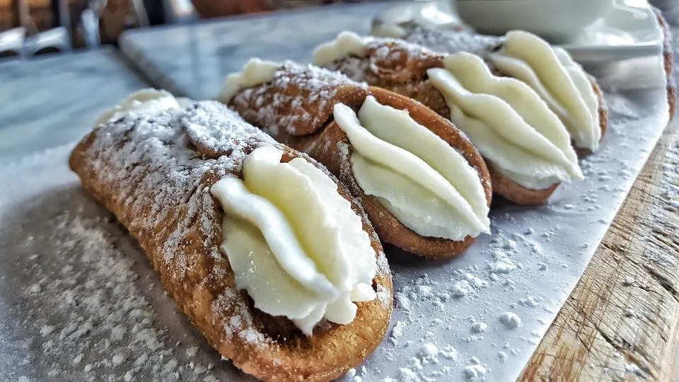 Cannoli are popular cakes and famous traditional foods in Italy 