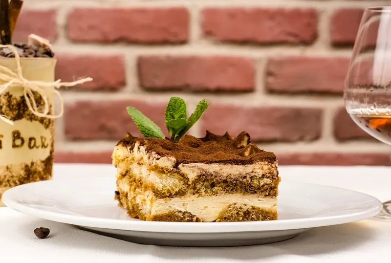 Italian Cuisine: 67 Most Famous Traditional Foods in Italy (2023) 58 Tiramisu is a popular Italian cake and one of most famous traditional foods in Italy
