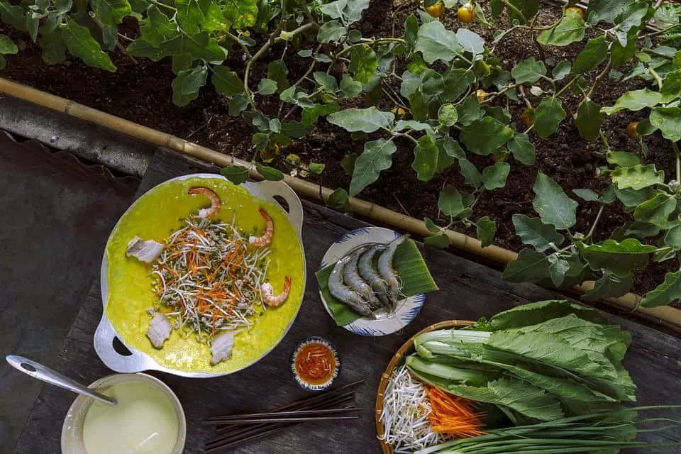 Best Vietnamese Food in Vietnam to Feed Your Inner Foodie on Your Trip To Vietnam 16 Banh Xeo crepes with shrimps are traditional Vietnamese food