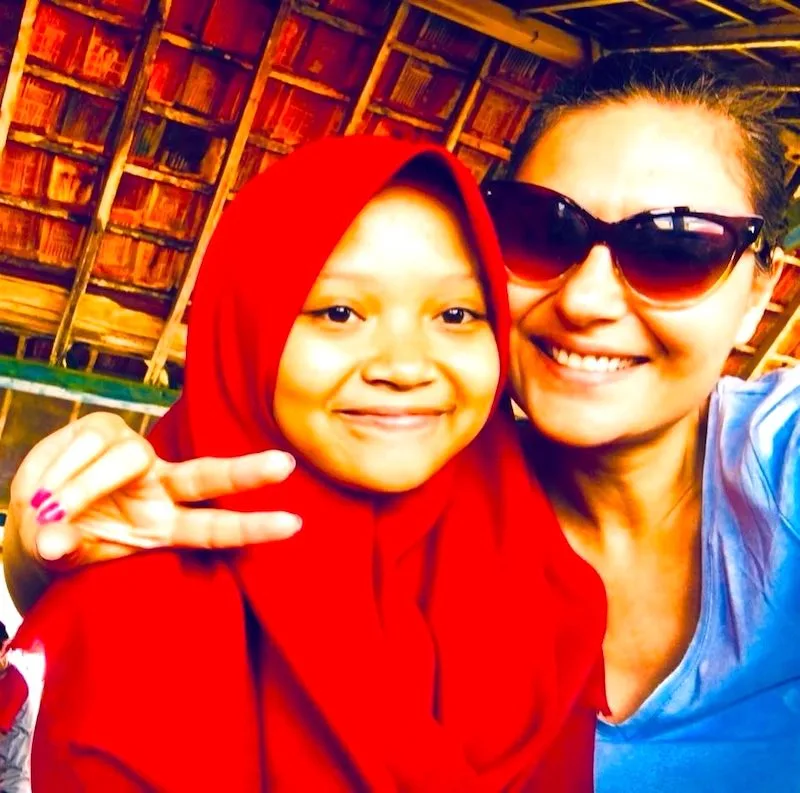 ABOUT 5 Milijana Gabric from WorldTravelConnector.com with an Indonesian girl