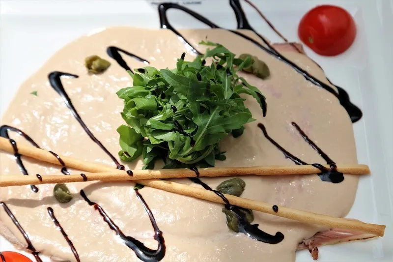 Italian Cuisine: 67 Most Famous Traditional Foods in Italy (2023) 34 Vitello Tonatto is one of the famous Italian dishes in Italy