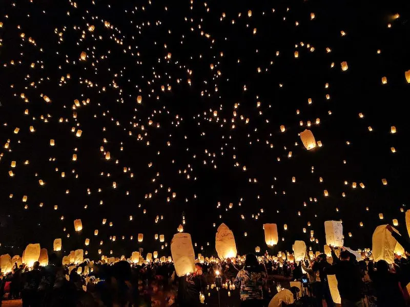 Releasing a sky lantern during Thai Lantern festival is one of the top Thailand things to do