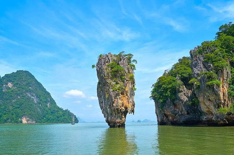 Visiting James Bond island in Phang Nga Bay in Thailand is one of the top Thailand things to do