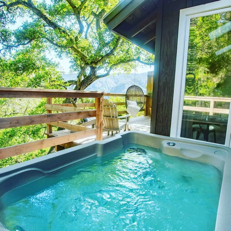 The Coziest Cabins In Big Sur You Wish You Could Escape To This Moment 15 This treehouse with a hot tube is one of the best Big Sur glamping rentals