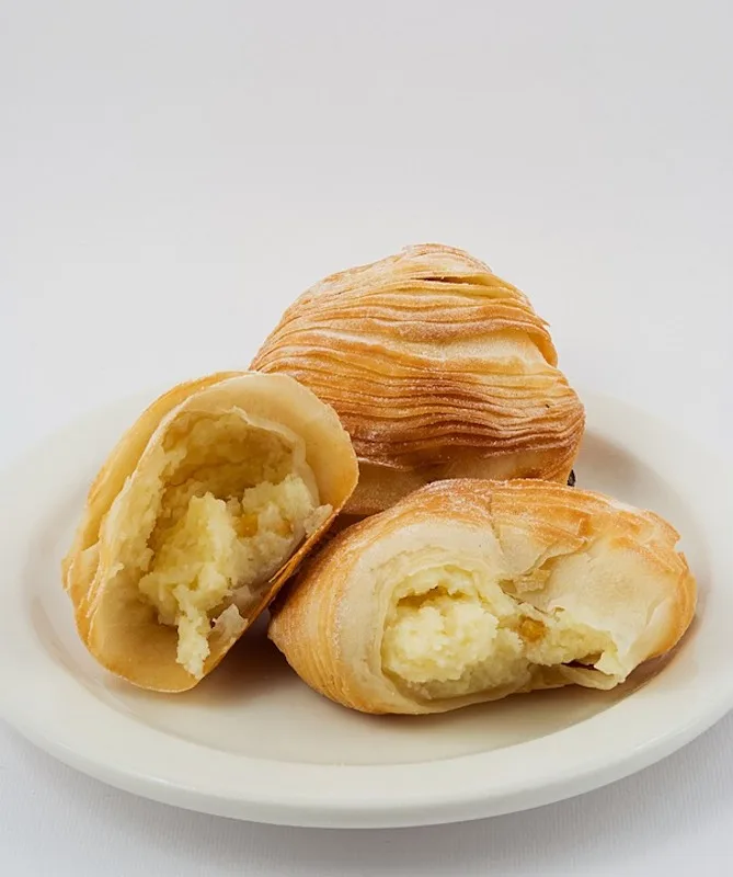 23 Best Italian desserts in Italy To Go For 2 Sfogliatelle are popular Italain desserts in Italy