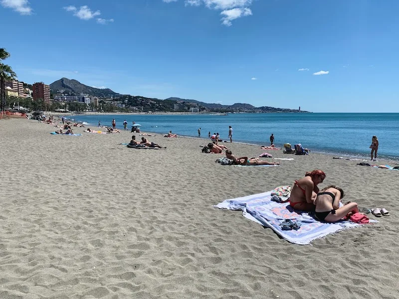 How to Spend A Week in Spain Itinerary (2023) 19 Swimming in La Malagueta beach is one of the best things to do in Malaga Spain