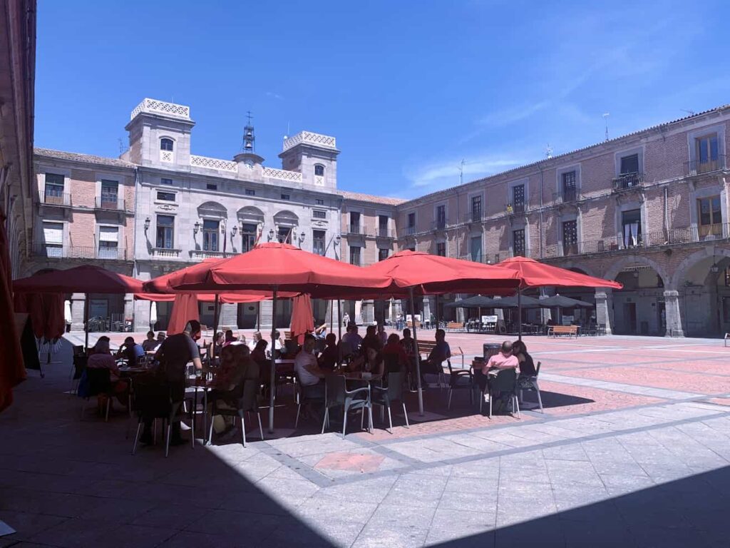 Strolling the Plaza Mercado Chico is one of the best things to do in Avila Spain 