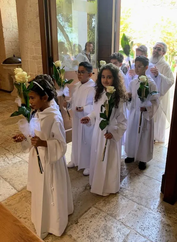 Wintessing the First communion in Alberobello Italy 