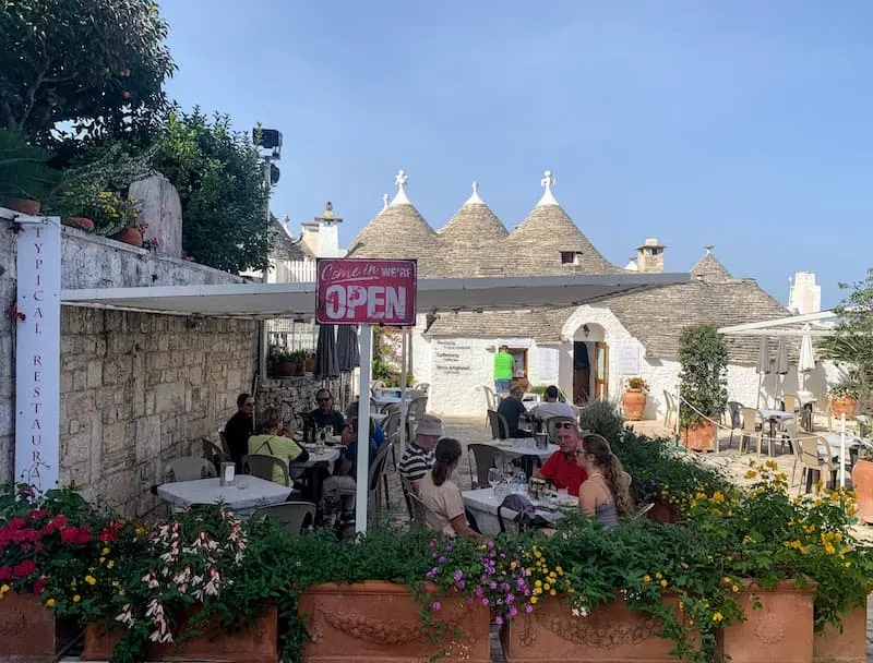 Sampling local dishes is among the best things to do in Alberobello 