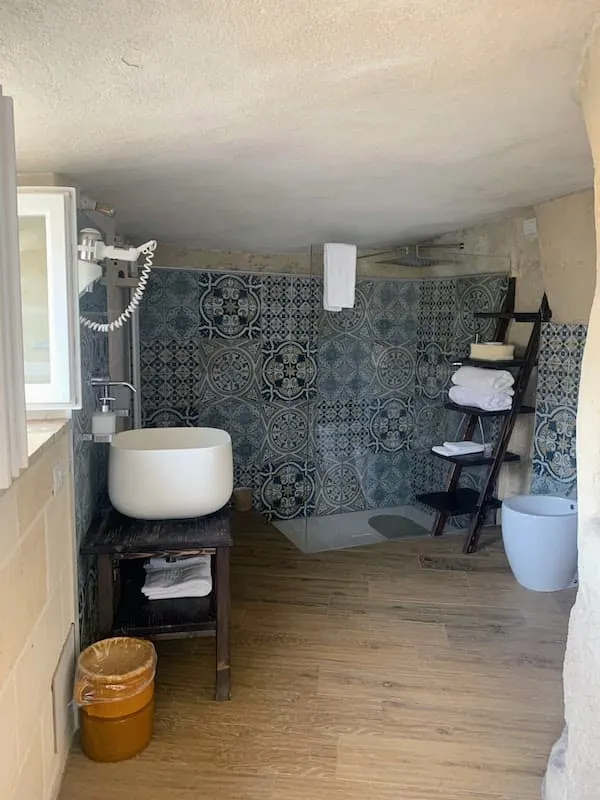 19 Top Things to do in Matera Italy (2023) 18 Matera Italy cave hotel bathroom