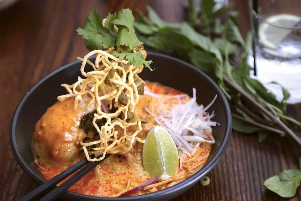 Tasting traditional Khao soi dish is among the best things to do in Chiang Mai Thailand 