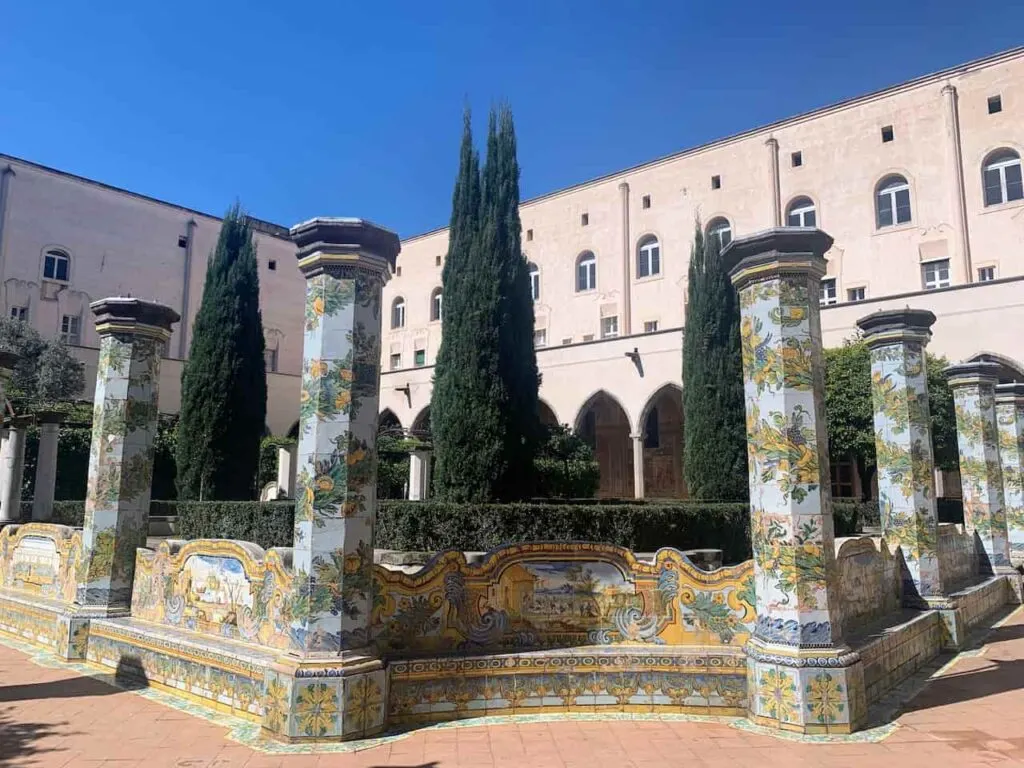 Visiting the cloister garden of Santa Chiara is among the top 10 best things to do in Naples Italy 