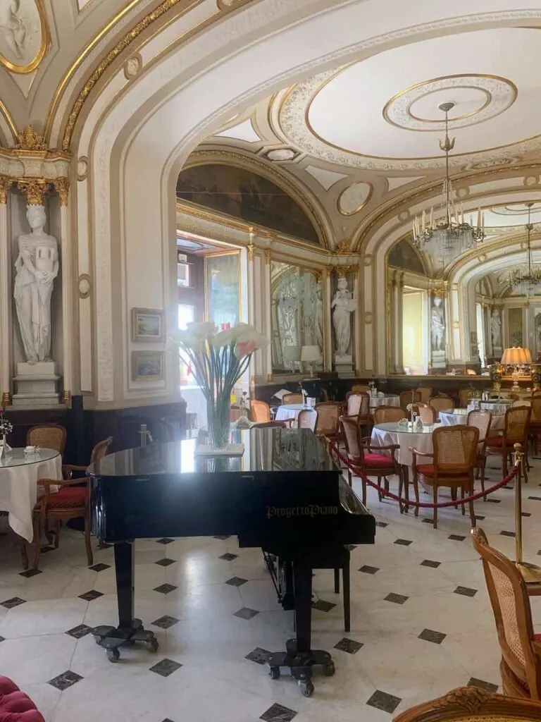 Enjoying the elegant atmosphere of Gran Caffè Gambrinus is among the best places to visit in Napels Italy 