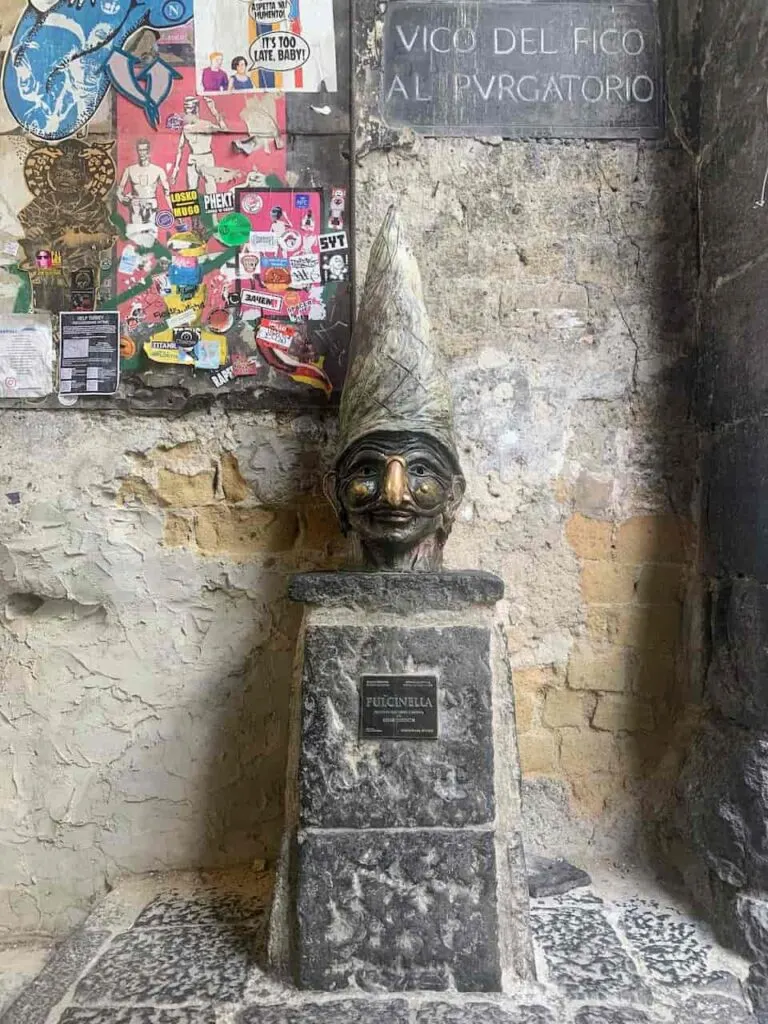 One day in Naples itinerary 13 Rubbing the nose of Pulcinella statue for good luck is a must do on any one day in Naples itinerary
