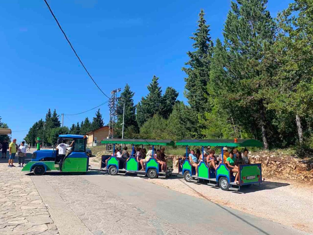 A mini tourist train in Kravice Waterfalls in Bosnia 