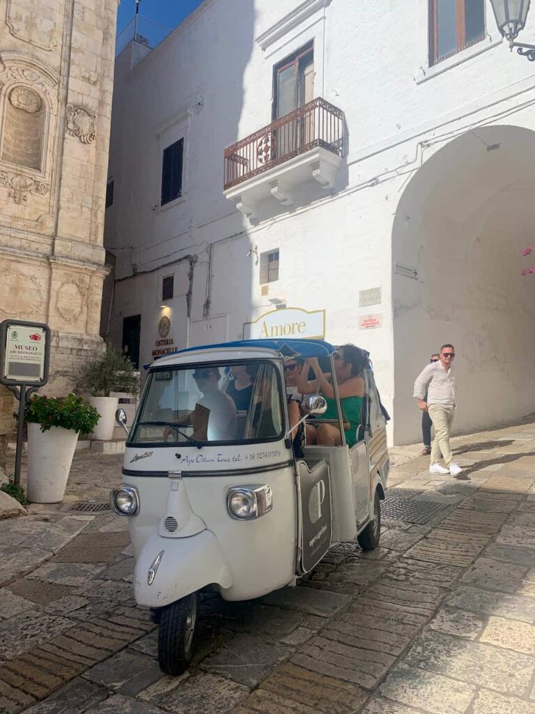 A tuk-tuk in Ostuni Italy. Exploring the ancient alleys by a tuk-tuk is one of the best things to do in Ostuni Italy 