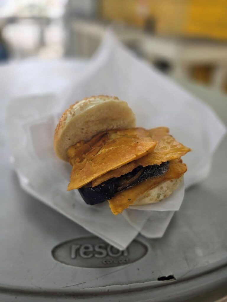 21 Must-Try Foods in Palermo That Will Blow Your Mind — Plus the Best Markets, Food Tours & Places to Savor Them! 8 Pane a Panelle - bread and chickpea fritters are popular Palermo foods