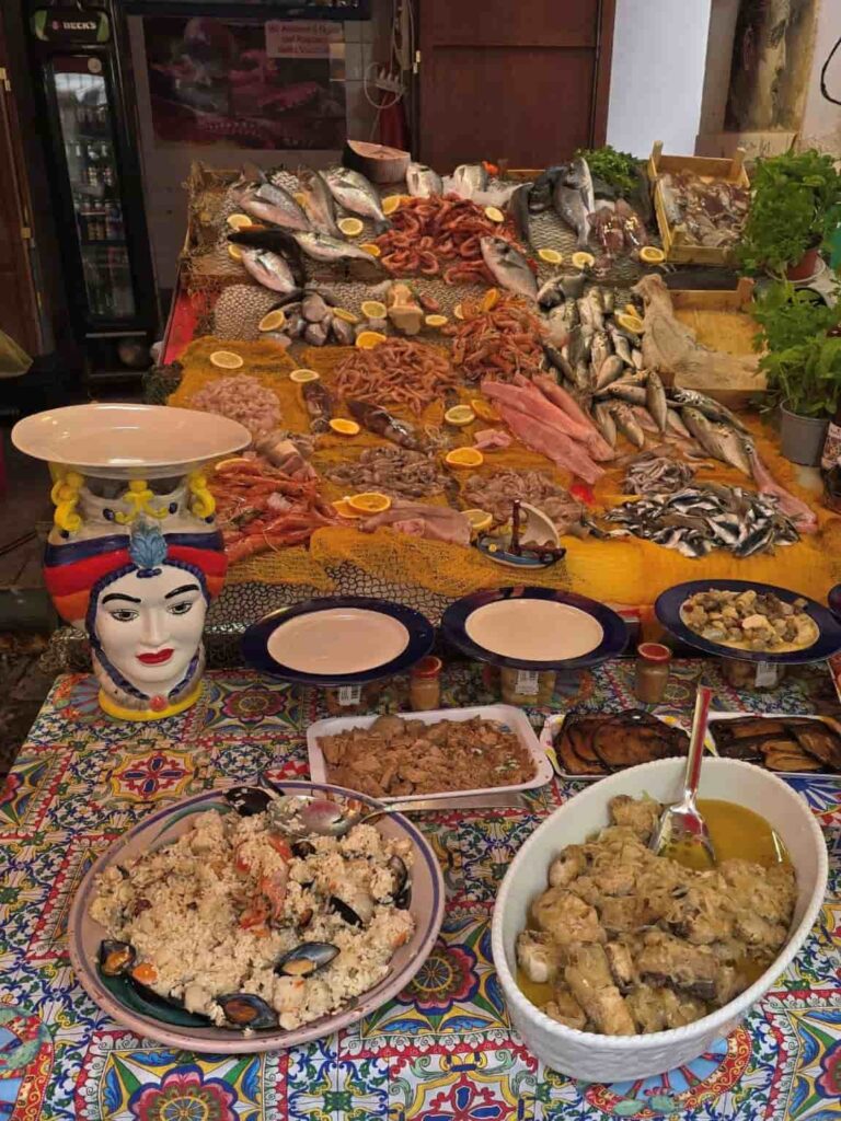 21 Must-Try Foods in Palermo That Will Blow Your Mind — Plus the Best Markets, Food Tours & Places to Savor Them! 2 Foods in Vucceria market in Palermo