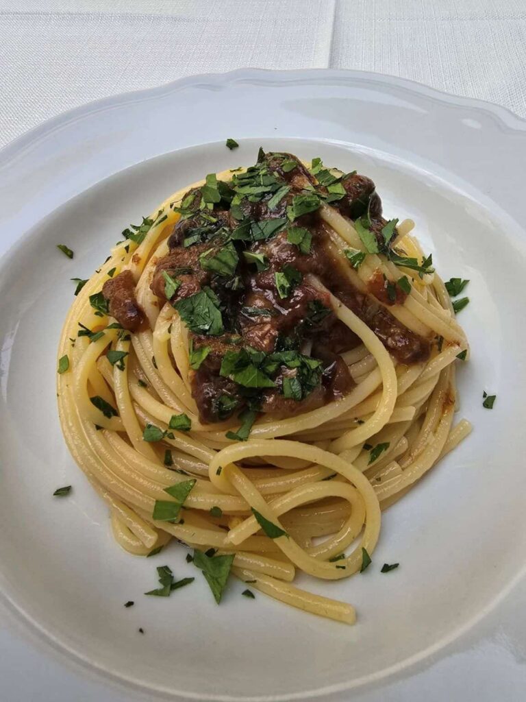 21 Must-Try Foods in Palermo That Will Blow Your Mind — Plus the Best Markets, Food Tours & Places to Savor Them! 5 Sea urchin pasta. It is a popuar food in Palermo