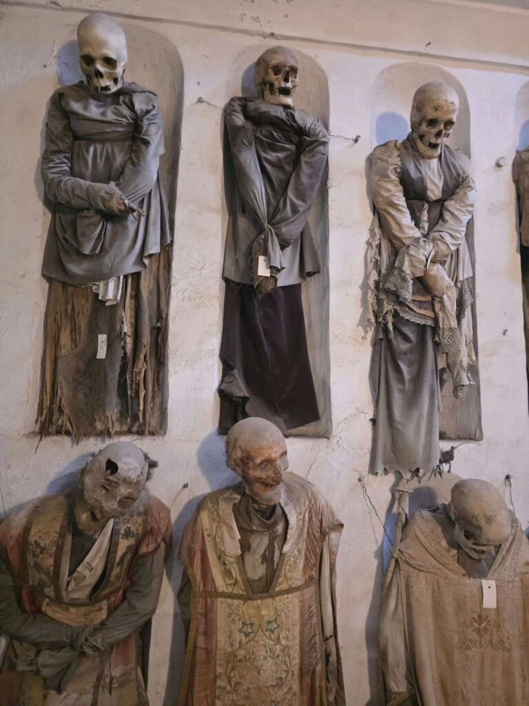 20 Unforgettable Things to Do in Palermo, Italy: Churches, Cannoli, and Crystal-Clear Seas 17 mummies of the Capuchin Catacombs in Palermo. Seeing them is among the most intersesting things to do in Palermo Italy