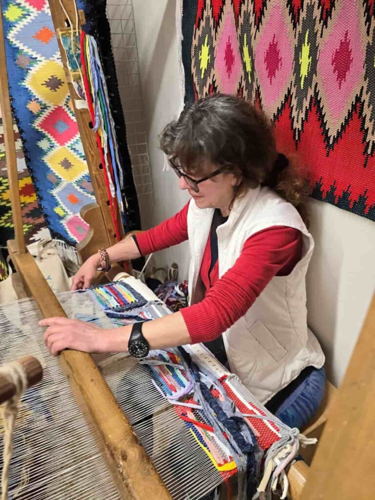 The Ultimate Erice, Sicily Bucket List: 13 Things You Need to Try NOW! 10 Making a rug in Erice Sicily. Watching the process of making a rug is among the best things to do in Erice Sicily
