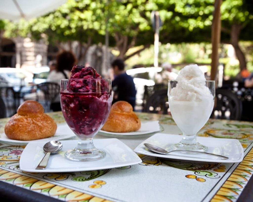 Almond granita and Black Mulberry granita with brioche. Granita is among the best traditonal Sicilian desserts. 