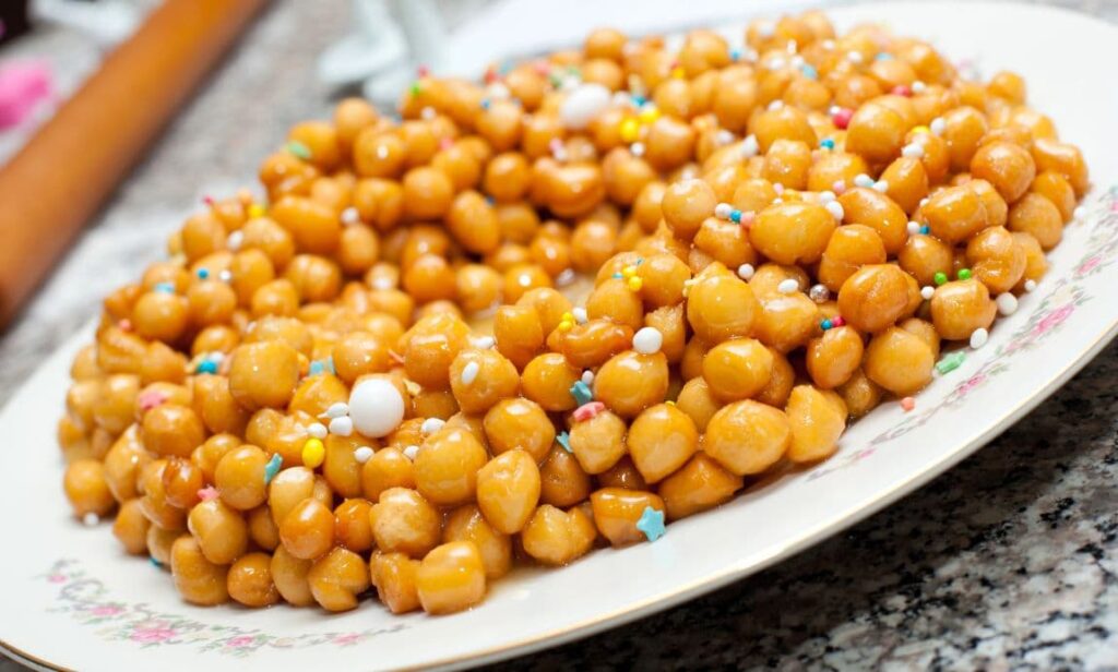Pignolata al Miele. these fried balls with honey are among the best traditional Sicilian desserts. 