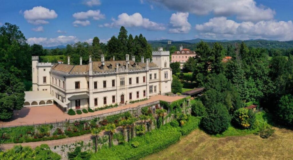 The Most Luxurious Secret Castle Hotels in Italy: Romantic Escapes You Won’t Believe You Can Stay In 8 Castello Dal Pozzo Resort near Lake Maggiore. It is one of the best Italys castle hotels.